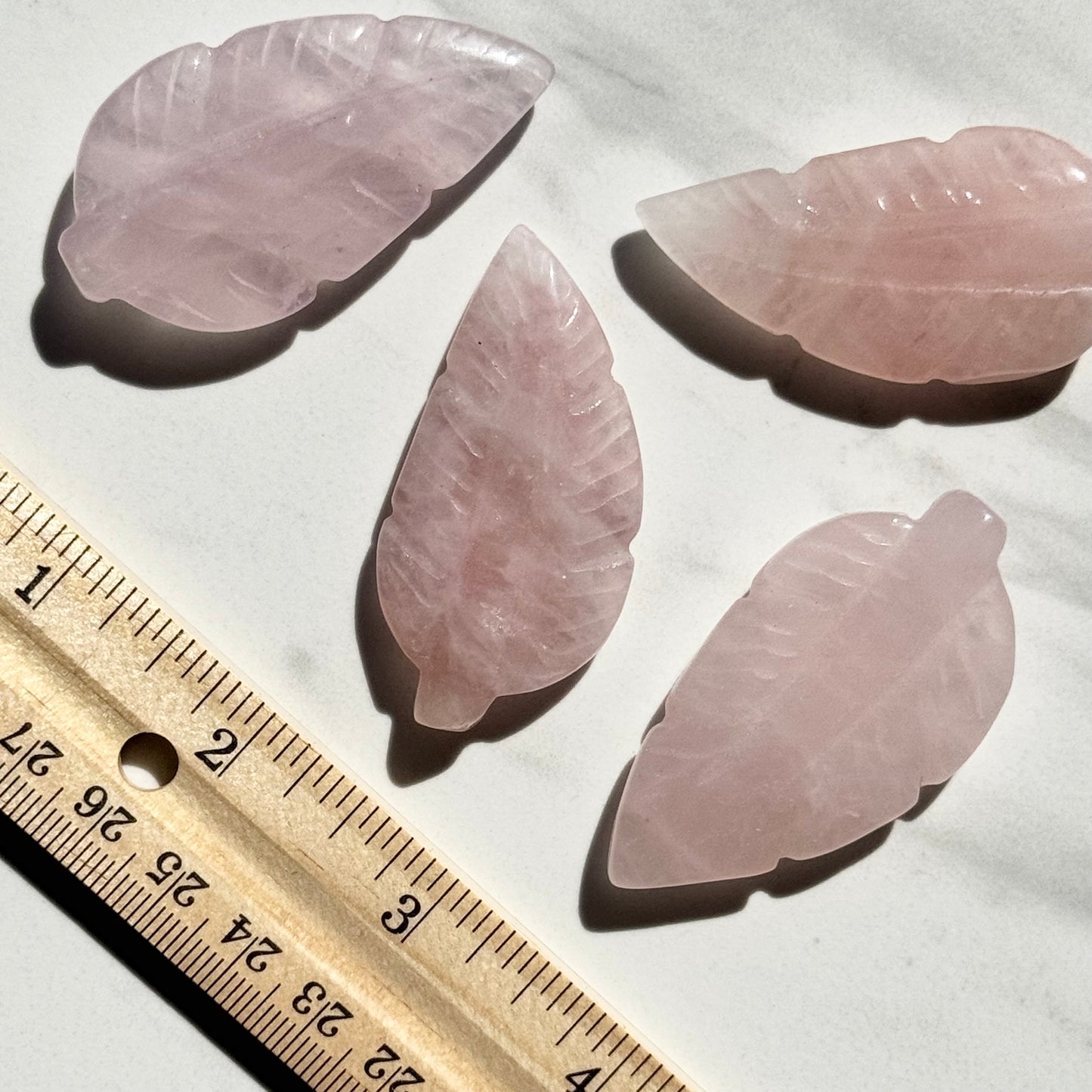 One (1) Beautiful Rose Quartz Feather Carving