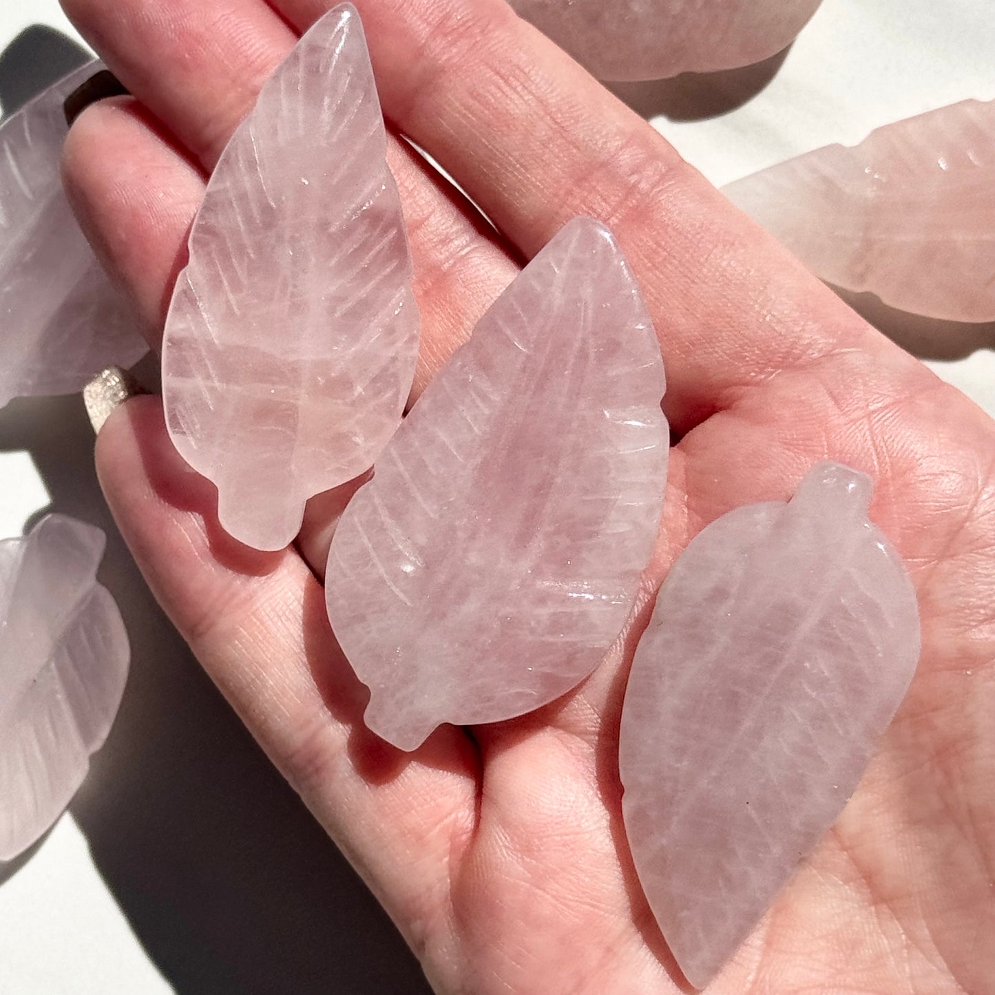 One (1) Beautiful Rose Quartz Feather Carving