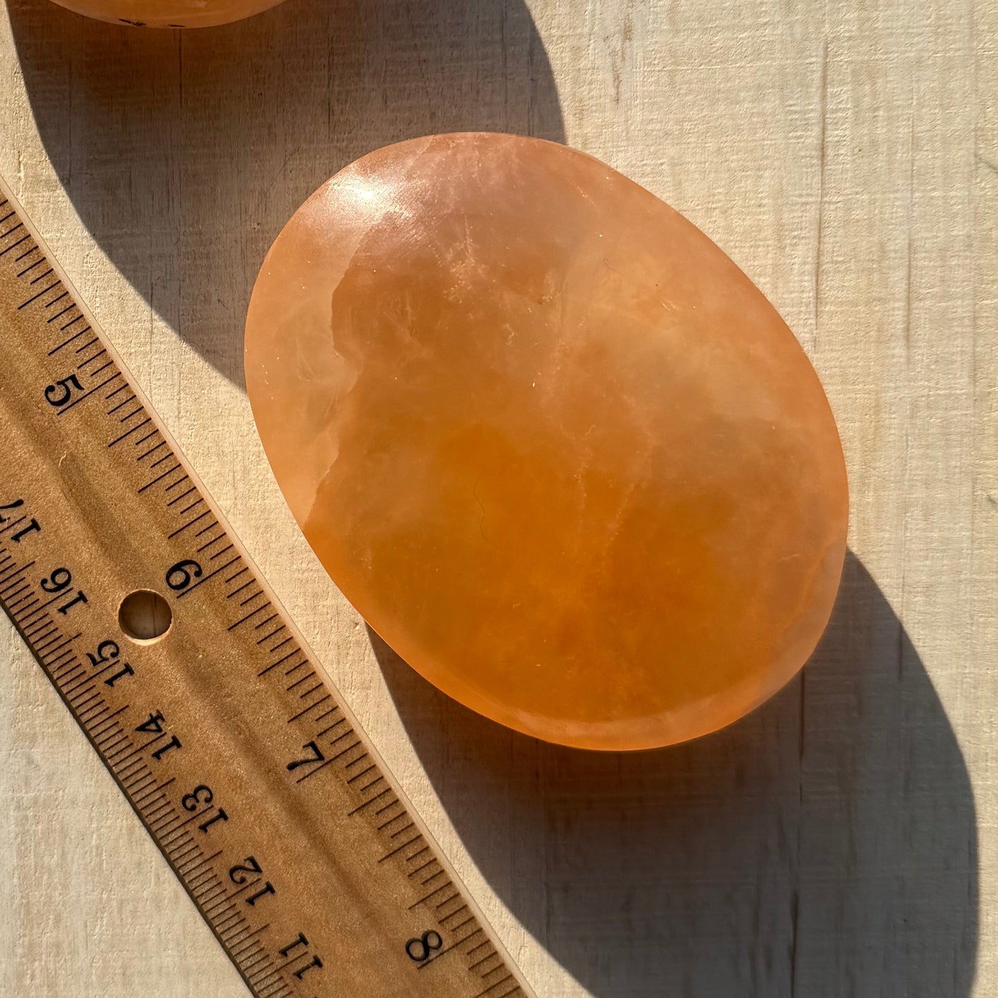 One (1) Large Peach Selenite Palm Stone from Morocco (~7.5cm)