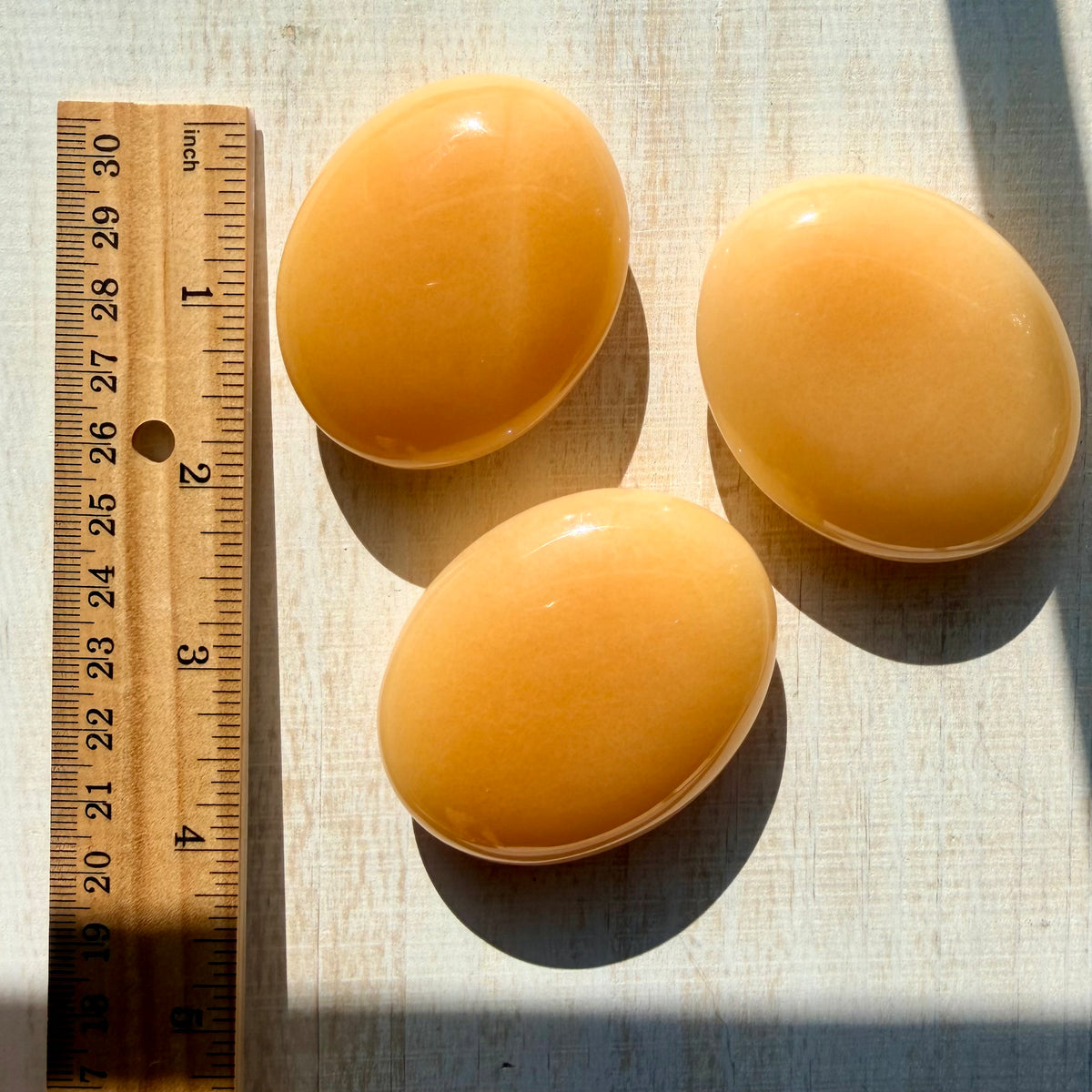Orange Calcite Palm Stone – Vibrant Crystal for Energy & Creativity