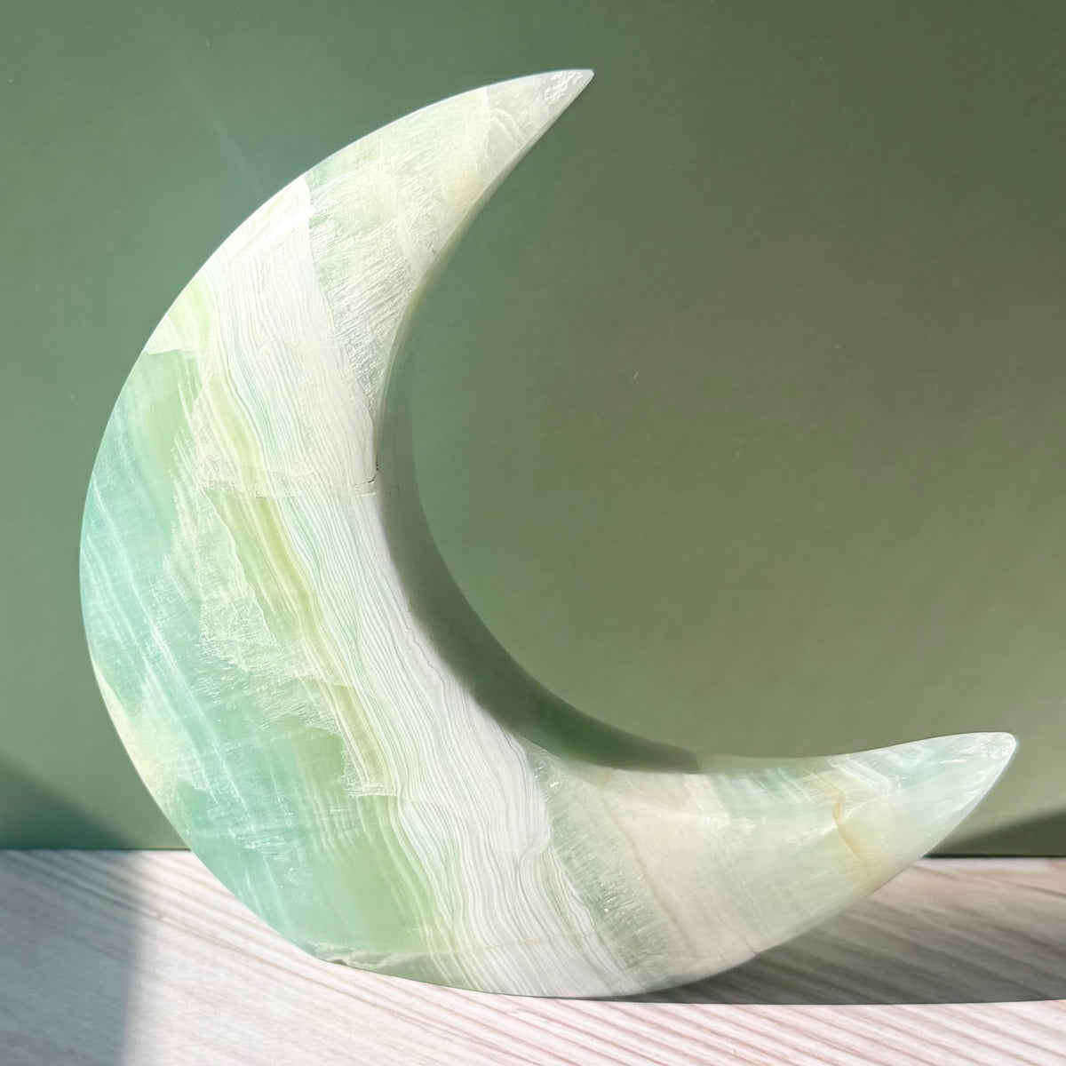 Pistachio Calcite Crescent Moon Carving – Soft Green Crystal for Peace