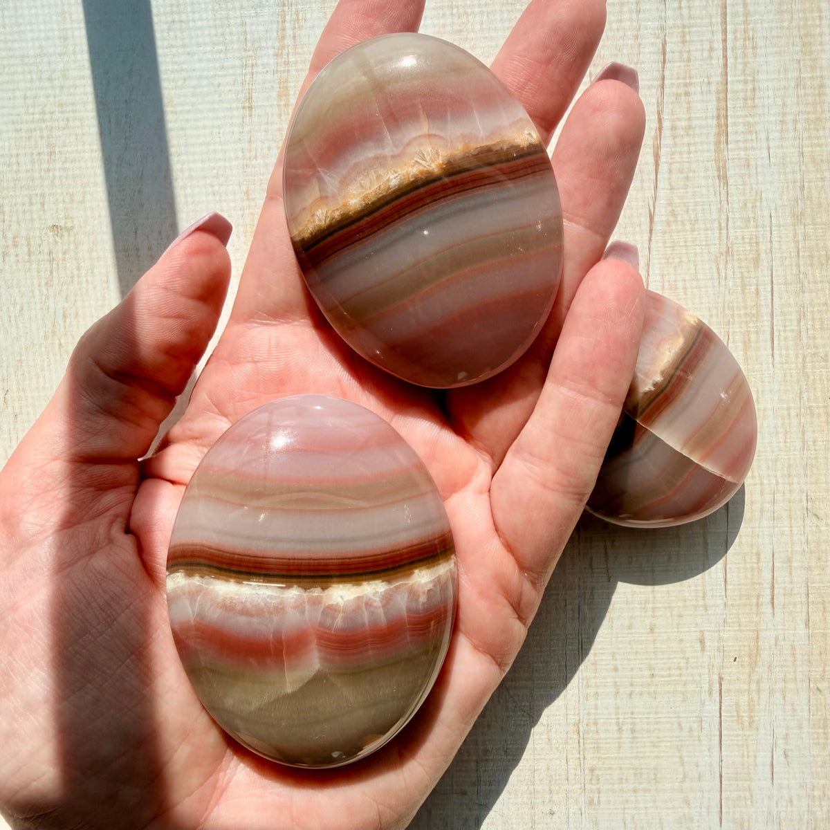 Neapolitan Banded Calcite Palm Stone – Warm Caramel Crystal for Calm