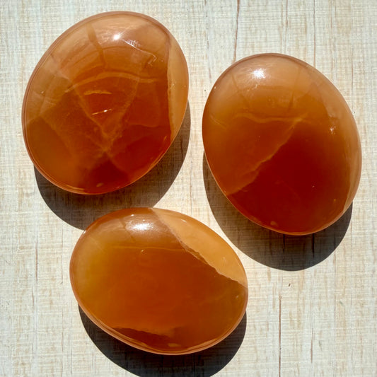 Honey Calcite Palm Stone – Golden Crystal for Joy & Self-Love