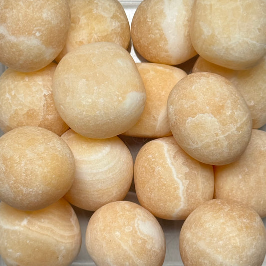 One (1) Common Quality Orange Calcite Tumble from Mexico