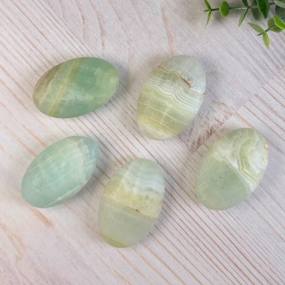 One (1) Pistachio Calcite Palm Stone | Intuitive Select