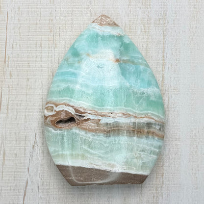 Caribbean Calcite Flame – Soothing Teal Crystal for Calm & Communication