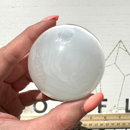 One (1) Medium Satin Spar Selenite Sphere from Morocco
