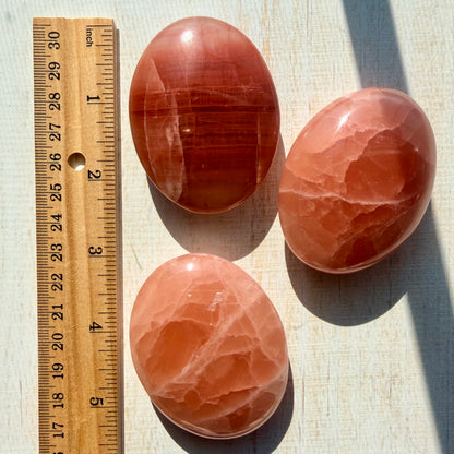 Rose Calcite Palm Stone – Warm Salmon Crystal for Self-Love