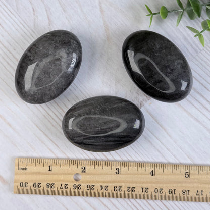 One (1) Silver Sheen Obsidian Palm Stone