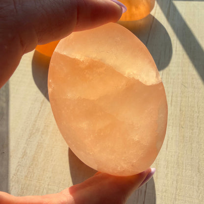 One (1) Large Peach Selenite Palm Stone from Morocco (~7.5cm)