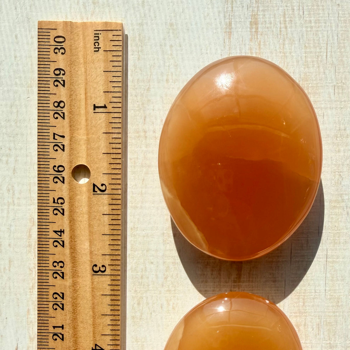 Honey Calcite Palm Stone – Golden Crystal for Joy & Self-Love