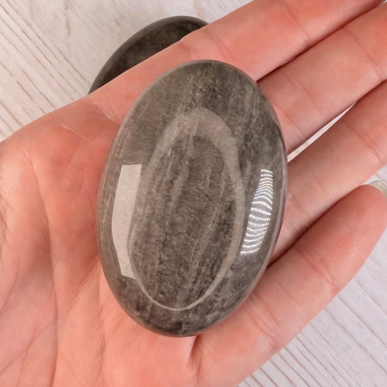 One (1) Silver Sheen Obsidian Palm Stone