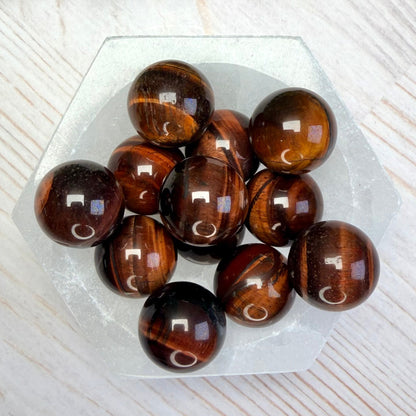 One (1) Red Tiger Eye Mini Sphere | Bull's Eye