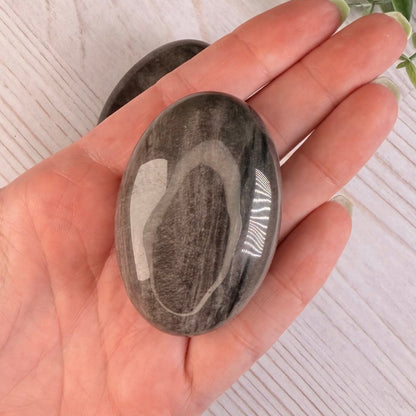 One (1) Silver Sheen Obsidian Palm Stone