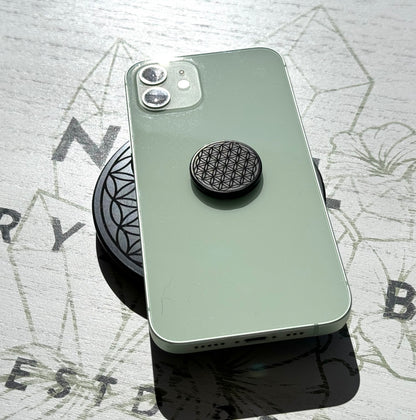 Shungite tile attached to phone case - flower of life