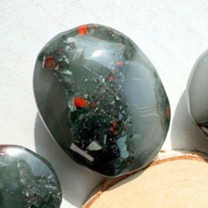 One (1) African Bloodstone Palm Stone