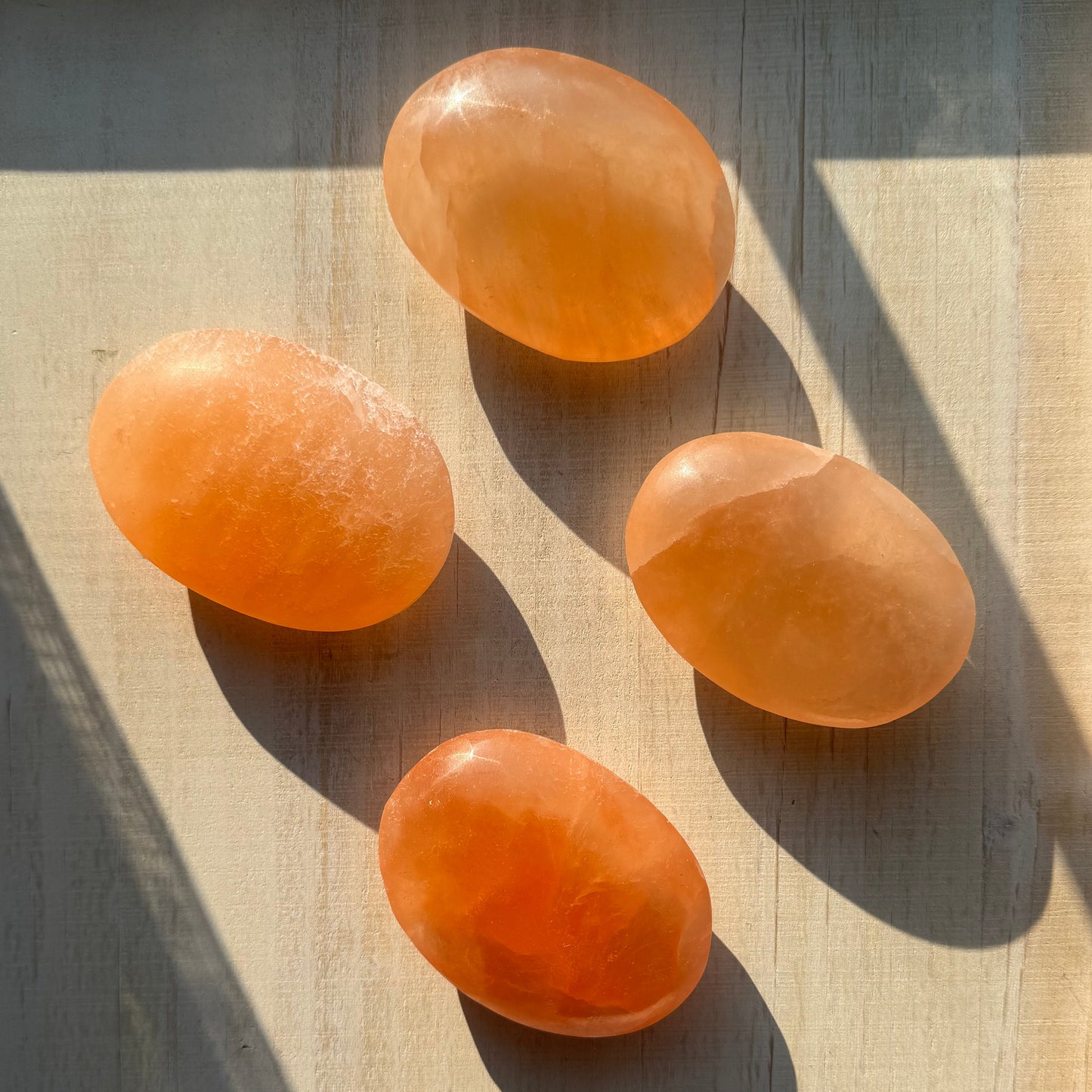 One (1) Large Peach Selenite Palm Stone from Morocco (~7.5cm)