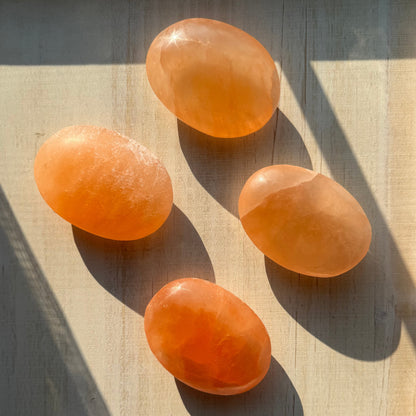 One (1) Large Peach Selenite Palm Stone from Morocco (~7.5cm)