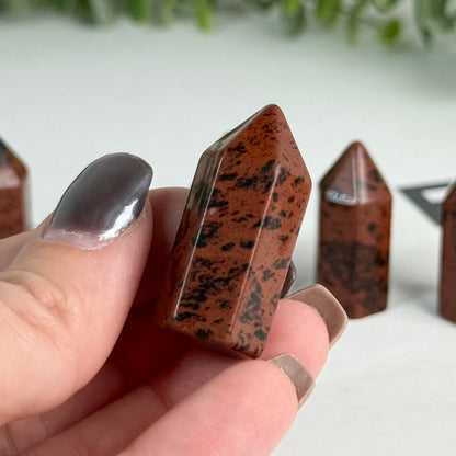 One (1) Mini Mahogany Obsidian Tower