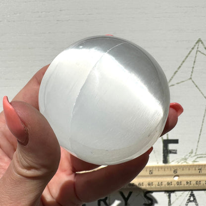 One (1) Medium Satin Spar Selenite Sphere from Morocco