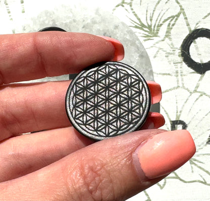 Shungite EMF blocking phone tile - front view - flower of life