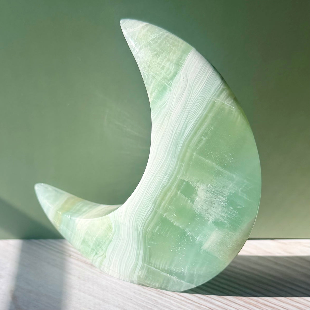 Pistachio Calcite Crescent Moon Carving – Soft Green Crystal for Peace