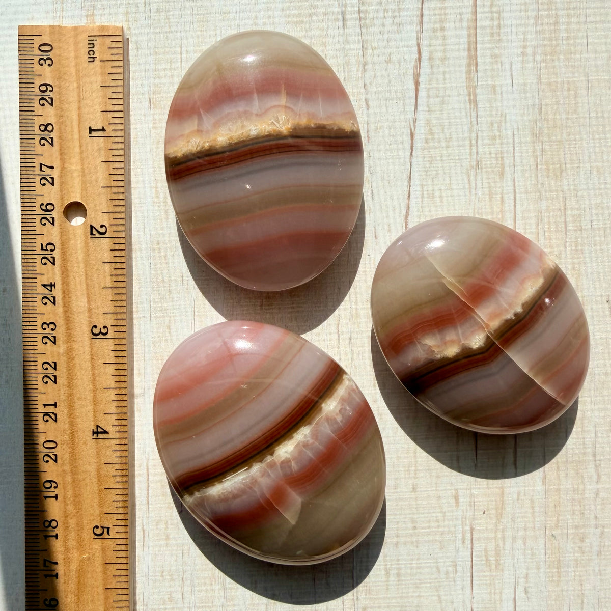 Neapolitan Banded Calcite Palm Stone – Warm Caramel Crystal for Calm