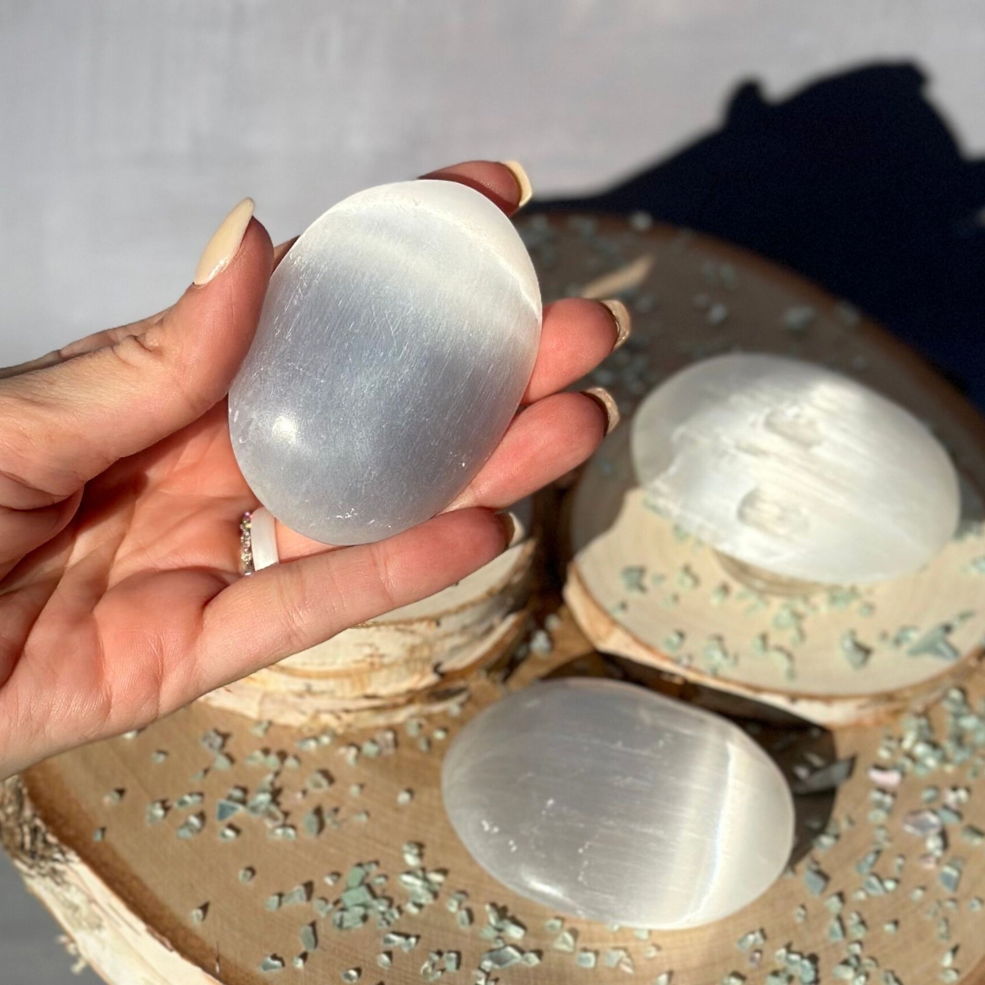 selenite palm stones