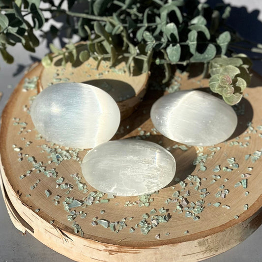 selenite palm stones